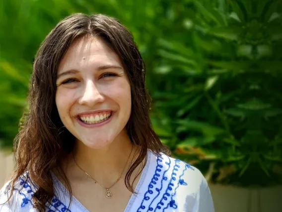 Kayla Tilicki, a white woman with brown hair, smiling.