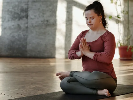 Photo Of Woman Meditating Alone. Photo by CliffBooth