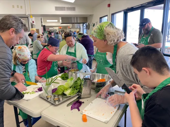 Sonoran Center Student Having a Cooking CLass at Tucson Village Farm