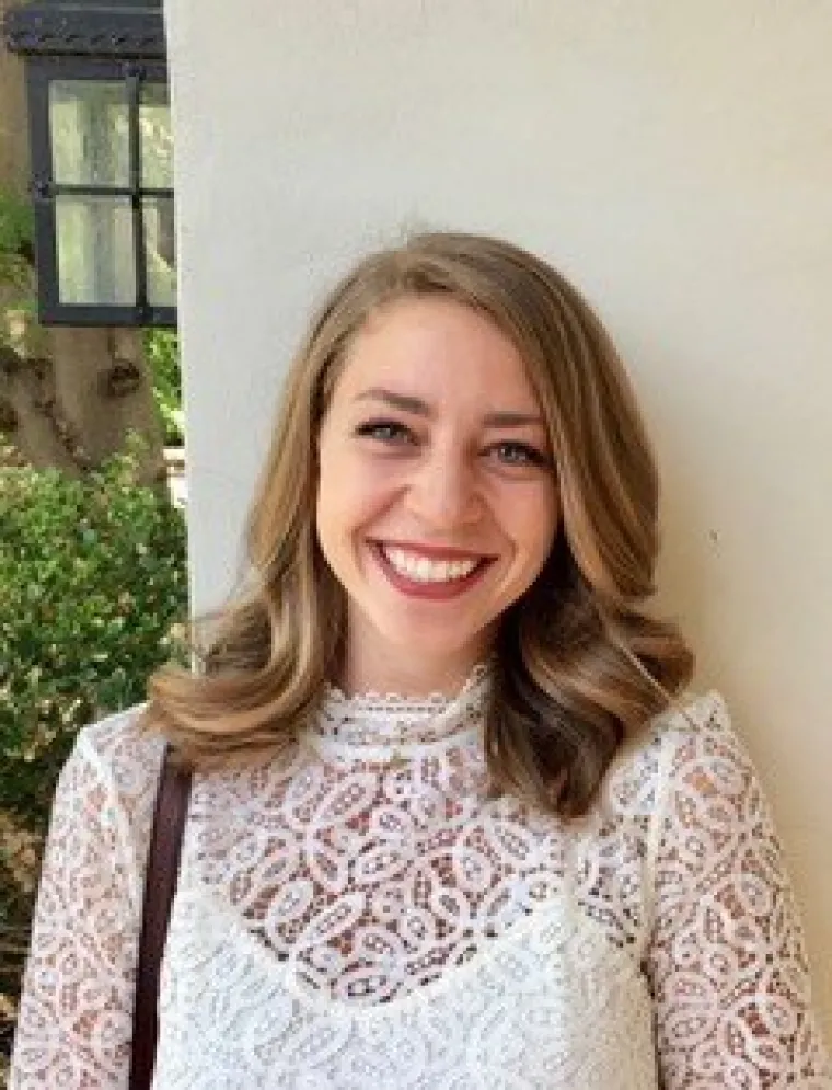 Clare, a blonde girl smiling