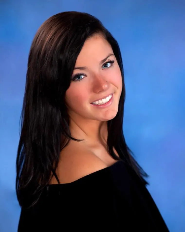 Woman with Dark long hair smiling