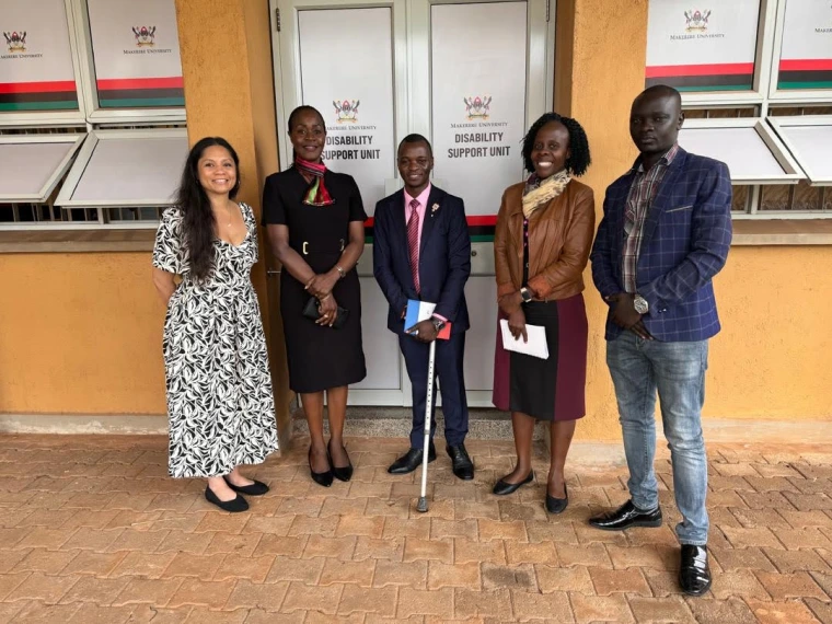 Jacy; Dean of Students, Dr. Winifred Kambubuli; Harunah; Disability Support Services director, Dr. Elizabeth Rwabu; and Martin Sanya outside of Makerere University’s Disability Support Unit.