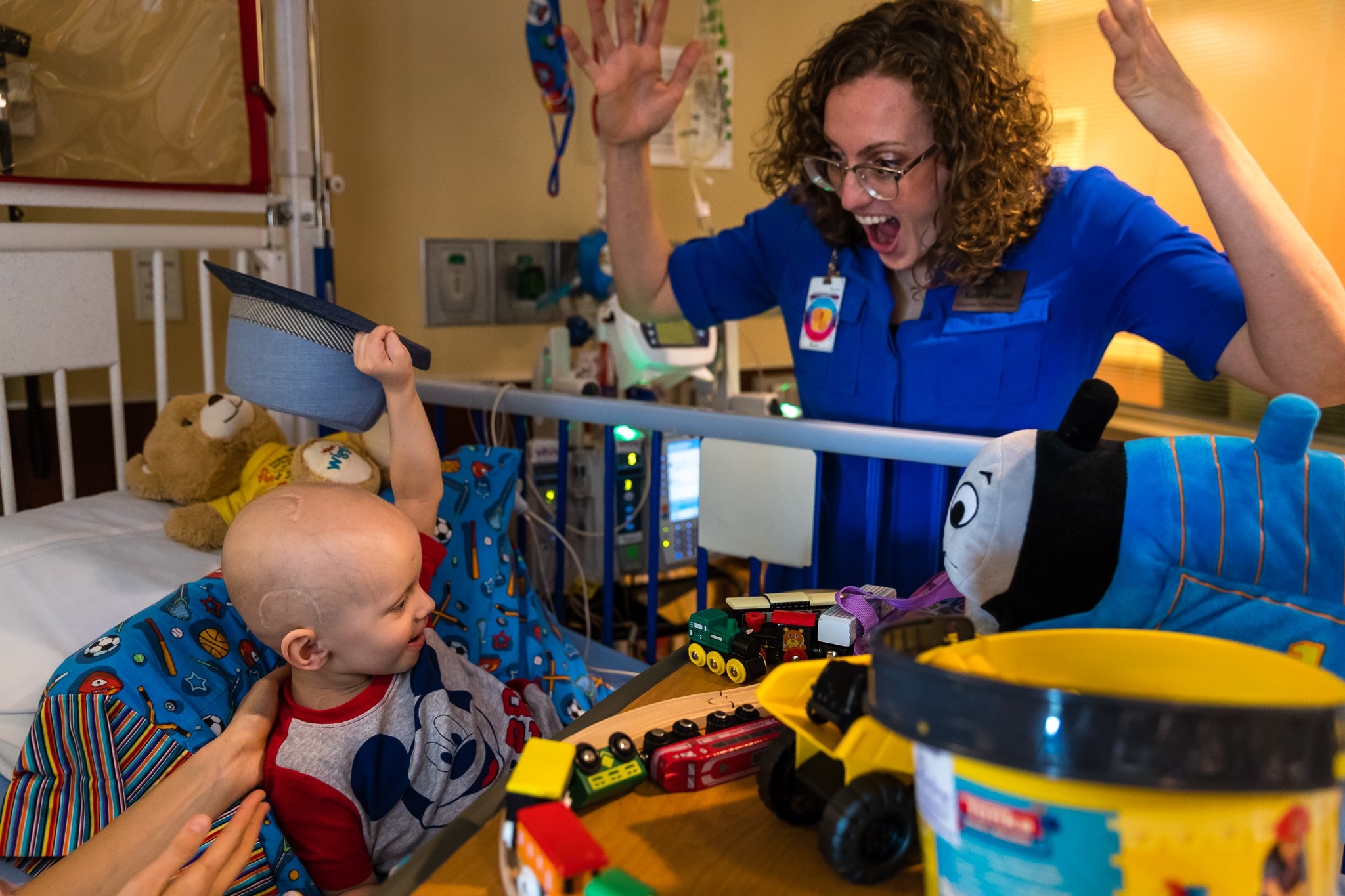 Integreative Touch organization: A healthcare worker is playing with an Autism pediatric patient   