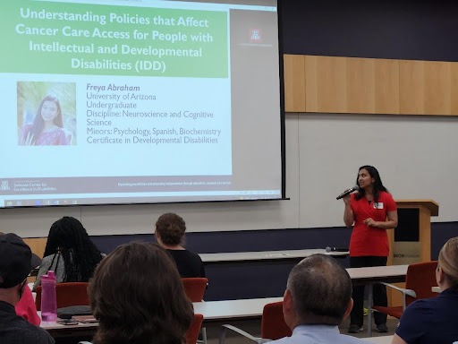  Freya Abraham gives her presentation, "Understanding Policies that Affect Care Access for People With Intellectual and Developmental Disabilities"