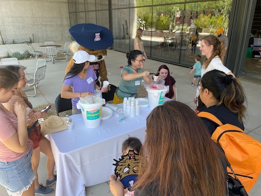 UArizona student volunteers, along with Wilbur Wildcat, dished out free frozen treats courtesy of eegee’s.