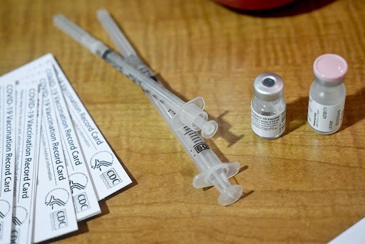 Syringes and a vial of medicine